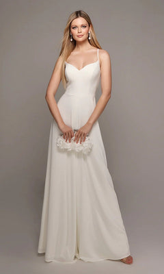 A woman in the Alyce 70022 long white jumpsuit with a sweetheart neckline holds a white floral clutch against a plain gray background.