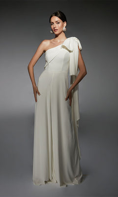 A woman models the Alyce 70065 long formal jumpsuit—a white, floor-length, one-shoulder outfit with a large bow detail—offering a chic cocktail dress alternative against a plain gray background.