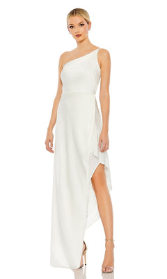 A woman wears the Mac Duggal 70177 High-Low Wedding Guest Dress, a white one-shoulder style with an asymmetrical hem, paired with strappy heels against a plain background.