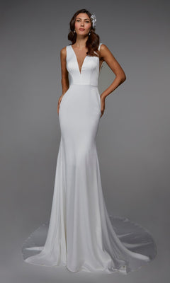 A woman models the Alyce 7021 long formal dress, a sleeveless white gown with a plunging V-neckline and subtle train, standing against a plain gray background.