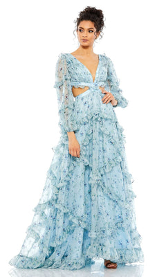 A woman stands against a white background wearing the Mac Duggal 70249 Long Sleeve Blue Formal Dress, featuring ruffles, floral print, a deep V neckline, and side cut-outs.