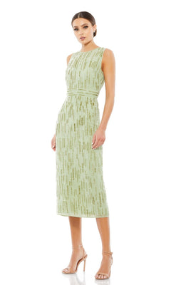 A woman in a sleeveless, light green Mac Duggal 70264 Beaded Midi Wedding Guest Dress with metallic details and nude heels stands against a white background.