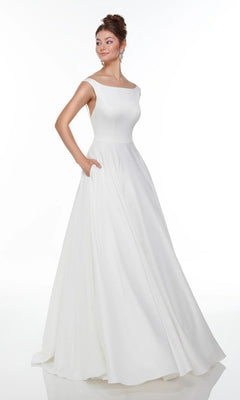 A woman stands against a plain white background, modeling the Alyce 7053: a sleeveless, floor-length white satin dress with an A-line skirt, boat neckline, and pockets.