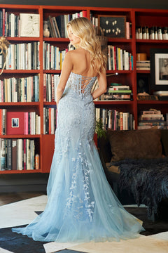 Back view of the Long Prom Dress: Amelia Couture 7096, a pale blue strapless mermaid gown with lace appliques and a corset-style back.