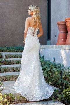 Amelia Couture 7097 strapless white lace floor-length gown with a corset-style lace-up back.