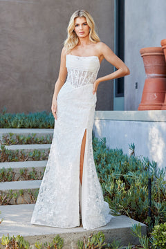 Strapless white lace floor-length Long Prom Dress: Amelia Couture 7097 with a corset-style bodice and a high leg slit.