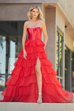 Amelia Couture 7099 red strapless ruffled corset dress with a crystal-embellished neckline and a tiered skirt featuring a high leg slit.