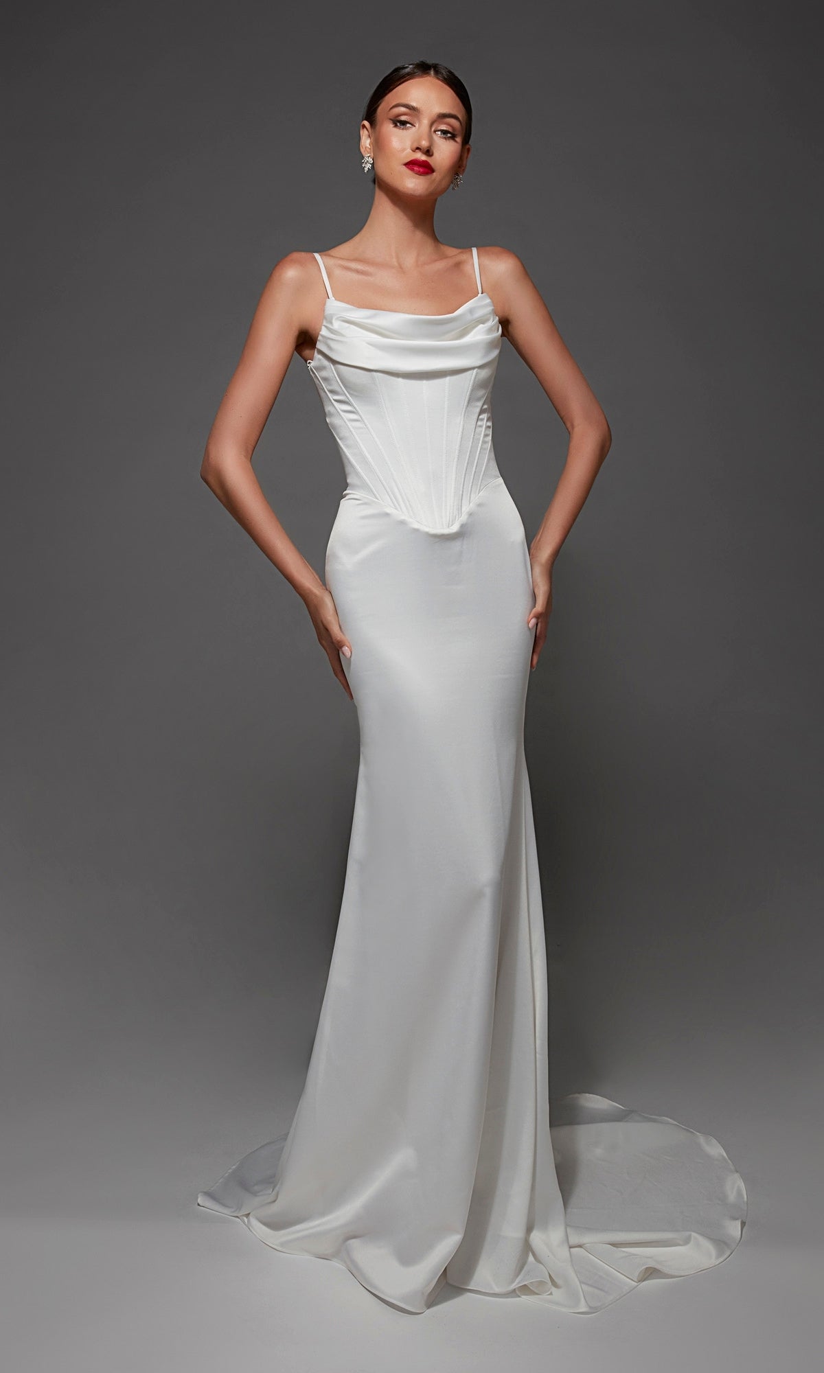 Diamond white fit-and-flare Alyce 7175 bridal gown featuring a corset bodice, elegant cowl neckline, delicate spaghetti straps, and a small train. This long wedding dress in satin perfectly blends timeless sophistication with modern charm.
