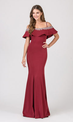 A woman wears the Eureka 7333 long prom dress in burgundy, featuring an off-the-shoulder design with ruffle detailing and rhinestone accents on the neckline, against a plain light background.