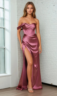 A woman in the Ladivine 7448 One-Shoulder Lace-Up Prom Dress, featuring a shiny mauve finish, thigh-high slit, and corset bodice, stands indoors beside a white brick wall and window.