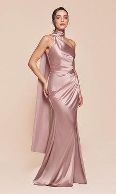 A woman poses against a plain beige background, wearing the One-Shoulder Sash Long Prom Dress (Ladivine 7454), a floor-length satin gown featuring a one-shoulder design and elegant draped detailing.