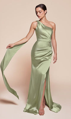 A woman poses in the One-Shoulder Sash Long Prom Dress: Ladivine 7454—a light green satin formal dress with a thigh-high slit and draped sash—against a plain beige background.