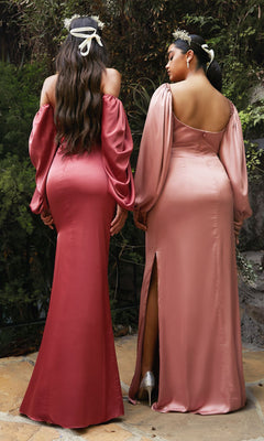 Two women stand outdoors with their backs to the camera, wearing Long Sleeve Long Wedding-Guest Dress 7482—elegant pink satin gowns with off-the-shoulder sleeves and matching floral headbands.