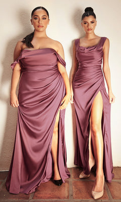 Two women pose side by side in Ladivine 7488 Long Faux-Wrap Formal Prom Dress with Slit, featuring mauve satin fabric, off-the-shoulder style, thigh-high slits, and neutral heels against a light wall on a tiled floor.