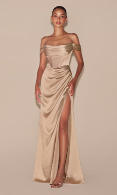 A woman models the Cowl-Neck Plus-Size Long Corset Prom Dress 7492C in champagne satin, featuring an off-the-shoulder design and thigh-high slit, paired with strappy heels against a plain beige background.