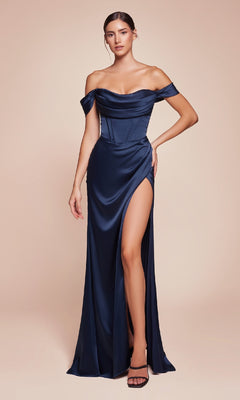 A woman in the Ladivine 7492-1 Cowl-Neck Long Satin Prom Dress in navy, featuring a corset bodice and high thigh slit, poses with one hand on her hip against a plain background.