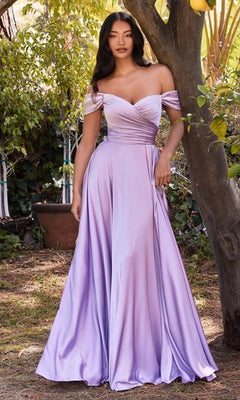 A woman stands outdoors in the Classic Off-Shoulder Long A-Line Prom Dress 7493—a budget-friendly, floor-length lavender gown featuring an off-the-shoulder neckline, fitted bodice, and flowing skirt.