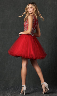 A woman poses in high heels against a dark background, wearing the Short Hoco Dress: Juliet 749—a sleeveless red homecoming dress with an embellished bodice and A-line tulle skirt.