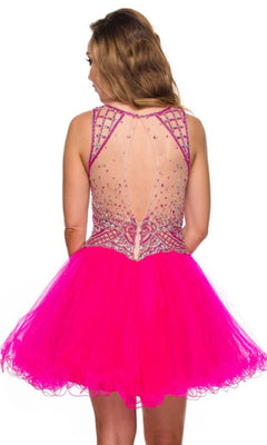 A woman wears the Juliet 761 short party dress, featuring a bright pink color, sleeveless design, sheer beaded back panel, and an A-line tulle mini skirt.