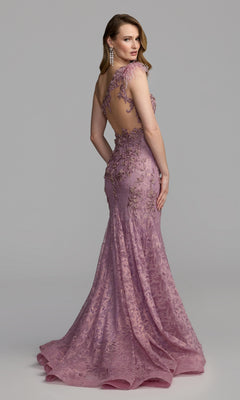 A woman poses in front of a plain gray background wearing the Mac Duggal 79264 Feather One-Shoulder Prom Gown—a floor-length evening dress in mauve with lace detailing, floral embroidery, and an open back that evokes the same elegance as a beaded gown.