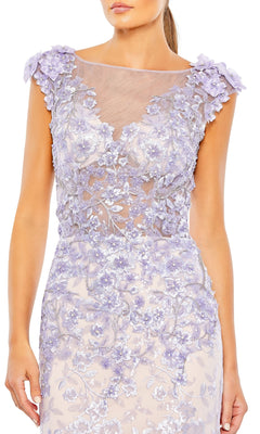 A woman wears the Long Formal Dress 79357 by Mac Duggal—a sleeveless lilac lace mermaid gown featuring a sheer illusion v-neckline and embroidered floral appliqués on the bodice and shoulders.