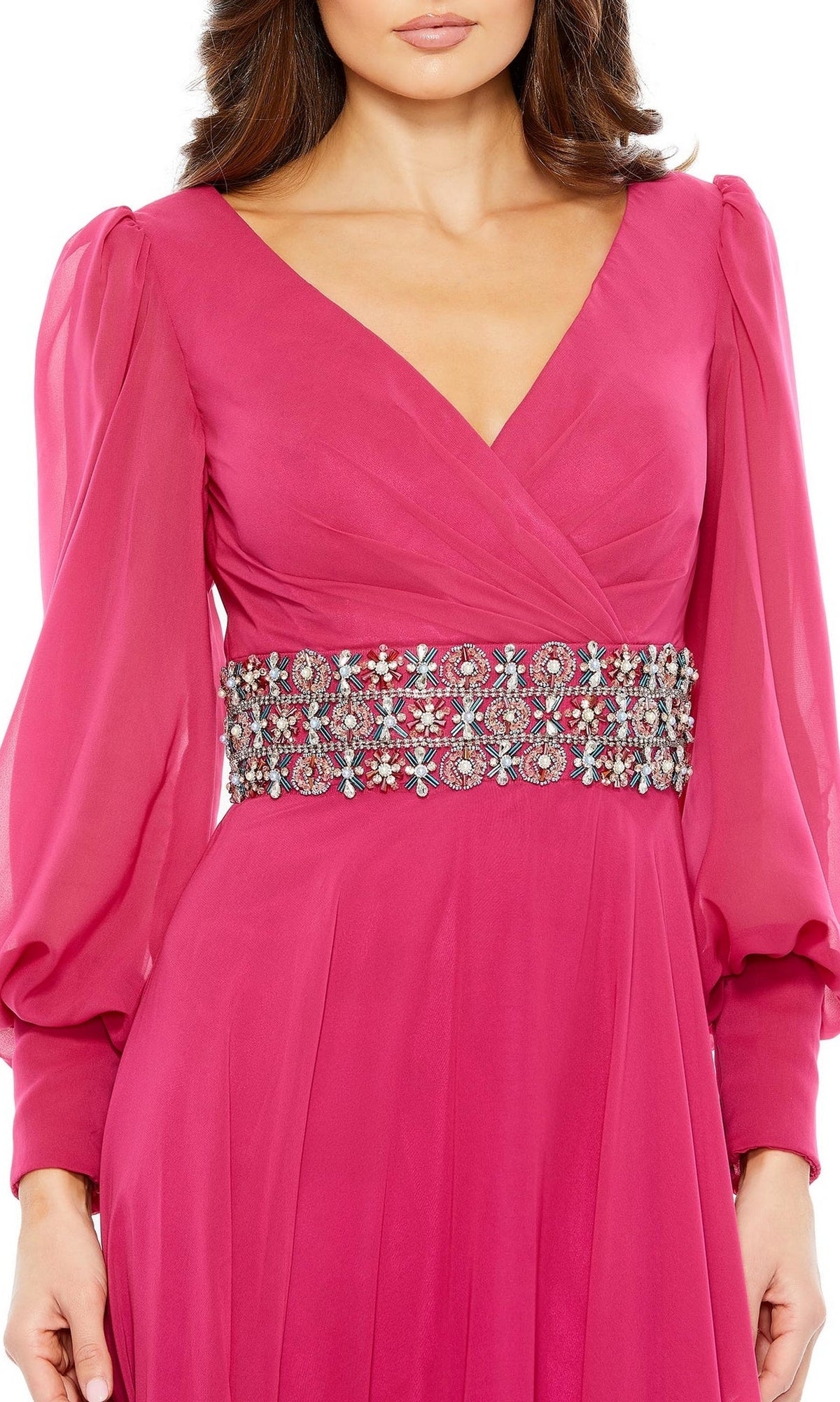 Elegant mother of the bride wears the Mac Duggal 79390—a deep pink, long-sleeve formal gown with a V-neckline and jeweled belt at the waist.