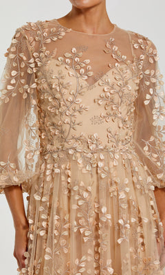 A person wearing the Mac Duggal 79399: a long sleeve blue formal dress with elegant embroidered floral and leaf patterns and slightly puffed three-quarter sleeves.
