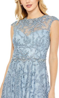 Woman in the Mac Duggal 79430 Long Beaded-Lace Formal Dress, a light blue evening gown featuring intricate lace embroidery and delicate beadwork at the waist and neckline.