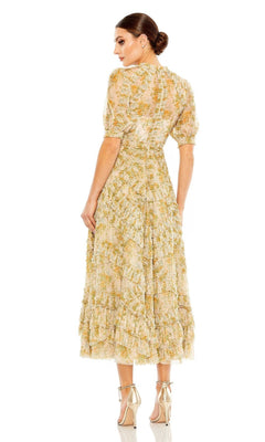Woman wearing the Mac Duggal 80111 Short Sleeve Wedding Guest Dress with a ruffled skirt, midi floral print, and beige high-heeled sandals, standing with her back to the camera.