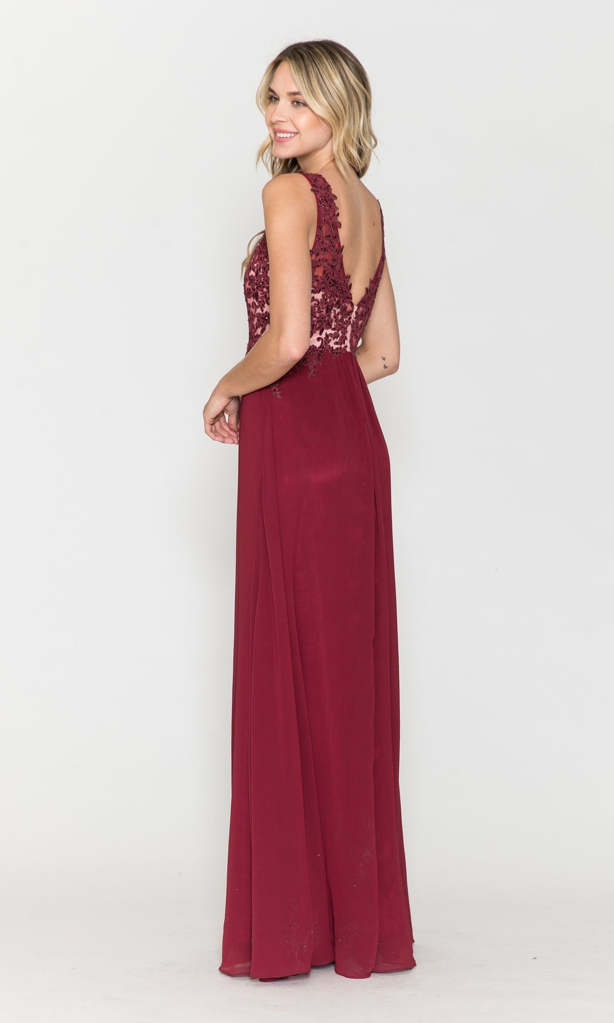 Smiling woman wearing the Sleeveless V-Neck Chiffon Long Prom Dress 8012, featuring lace bodice detailing and a floor-length burgundy design, stands against a plain white background.
