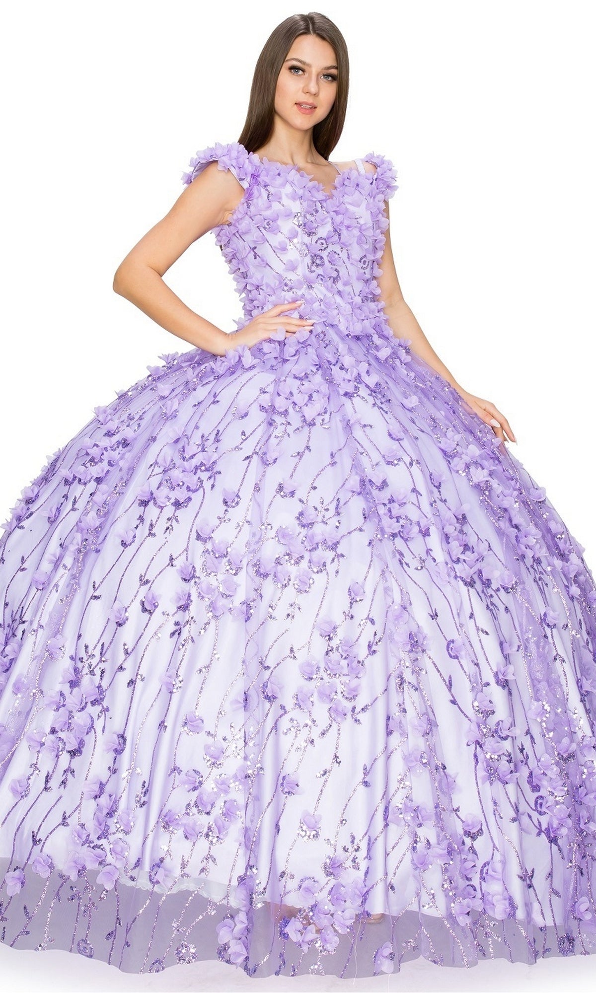 A woman wearing the Quinceanera Ball Gown 8021J, featuring an off-the-shoulder design, lace-up corset bodice, and 3D floral details, stands against a white background.