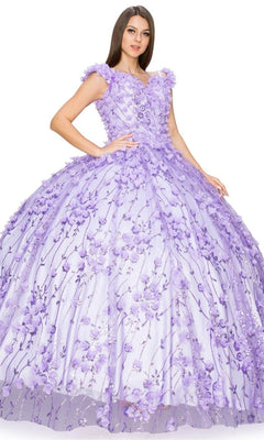 A woman wearing the Quinceanera Ball Gown 8021J, featuring an off-the-shoulder design, lace-up corset bodice, and 3D floral details, stands against a white background.