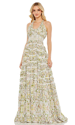 A woman wears the Mac Duggal 8023 Long Floral-Print Formal Dress, featuring a sleeveless fitted bodice and tiered floor-length skirt, posing against a plain white background.