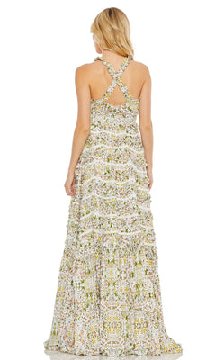 Woman in the Mac Duggal 8023 long floral-print formal dress with a tiered skirt and crisscross back straps, shown from behind.