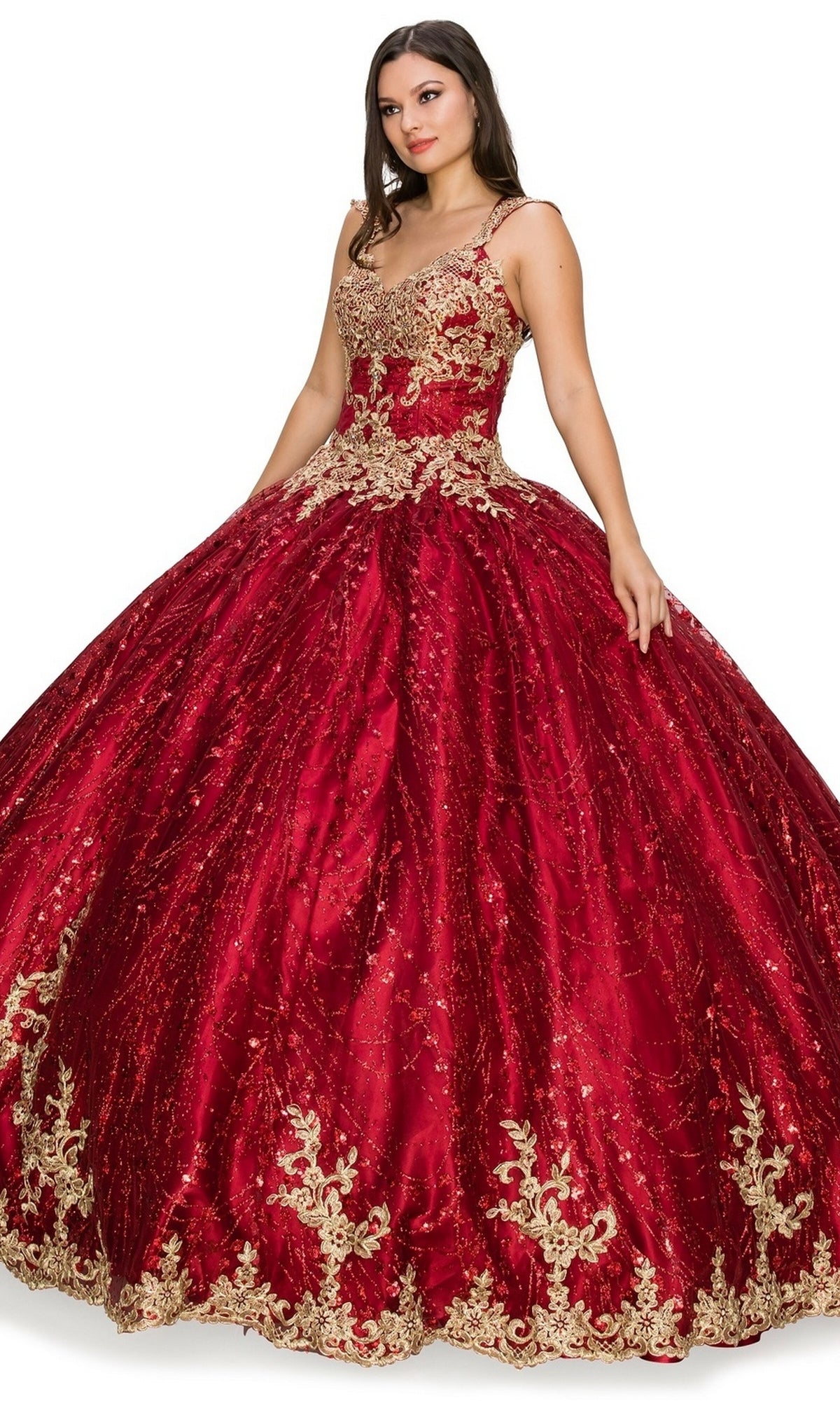 A woman stands against a white background wearing the Quinceanera Ball Gown 8024J in red, featuring gold lace embroidery and a full, voluminous skirt.