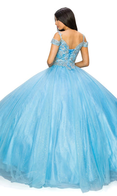 A woman stands with her back to the camera, wearing the Quinceanera Ball Gown 8028J—an off-the-shoulder dress featuring a lace-up back and a full, glitter tulle ball gown skirt.