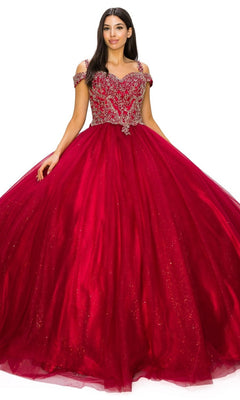 A woman wearing the Quinceanera Ball Gown 8028J, featuring an off-the-shoulder design, fitted beaded bodice, and a full sparkling glitter tulle ball gown skirt.
