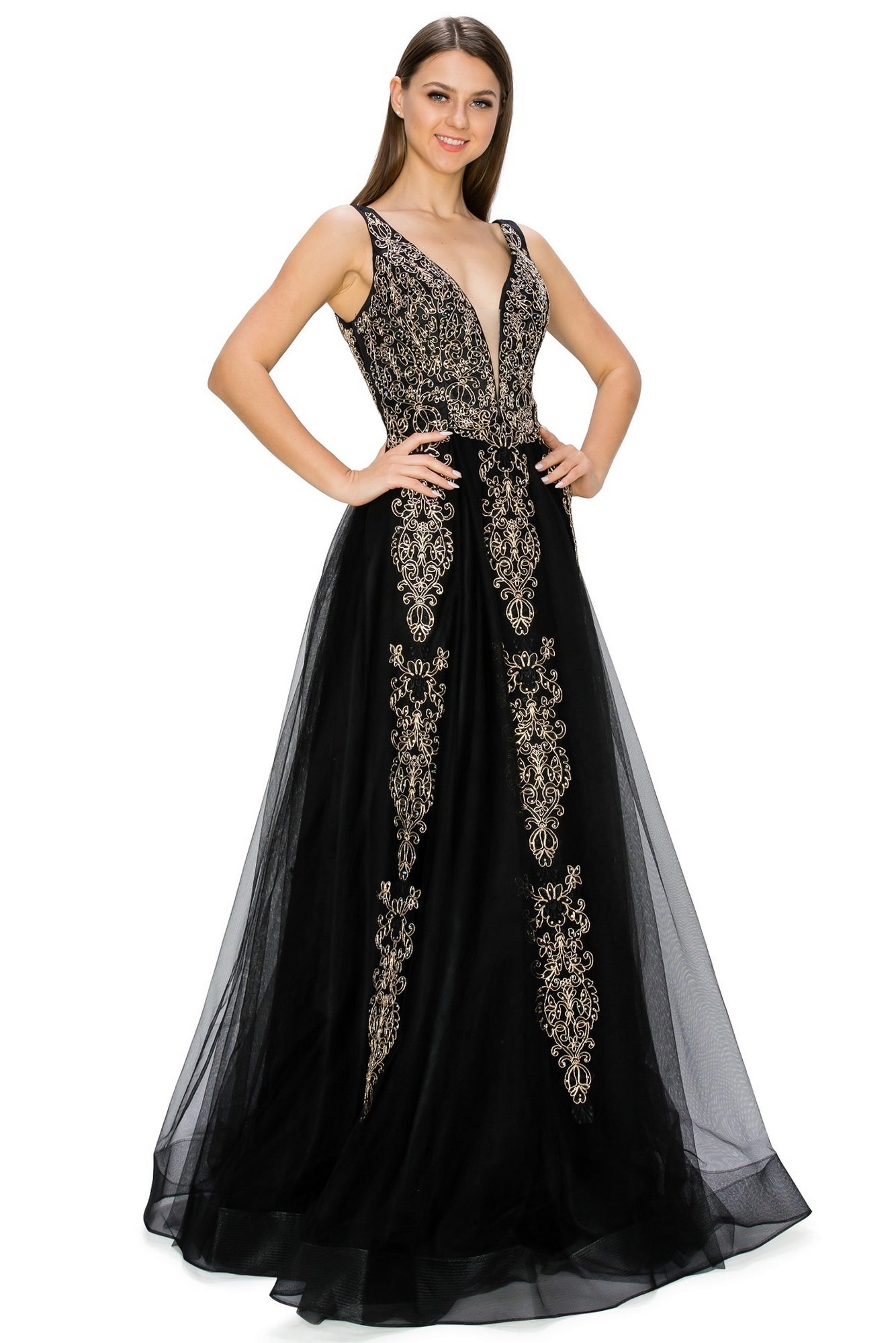 A woman smiles with hands on hips in the A-Line Gold-Embroidered Long Prom Ball Gown 8029J, featuring a deep V-neck and exquisite gold embroidery—an elegant, affordable choice for any evening event.