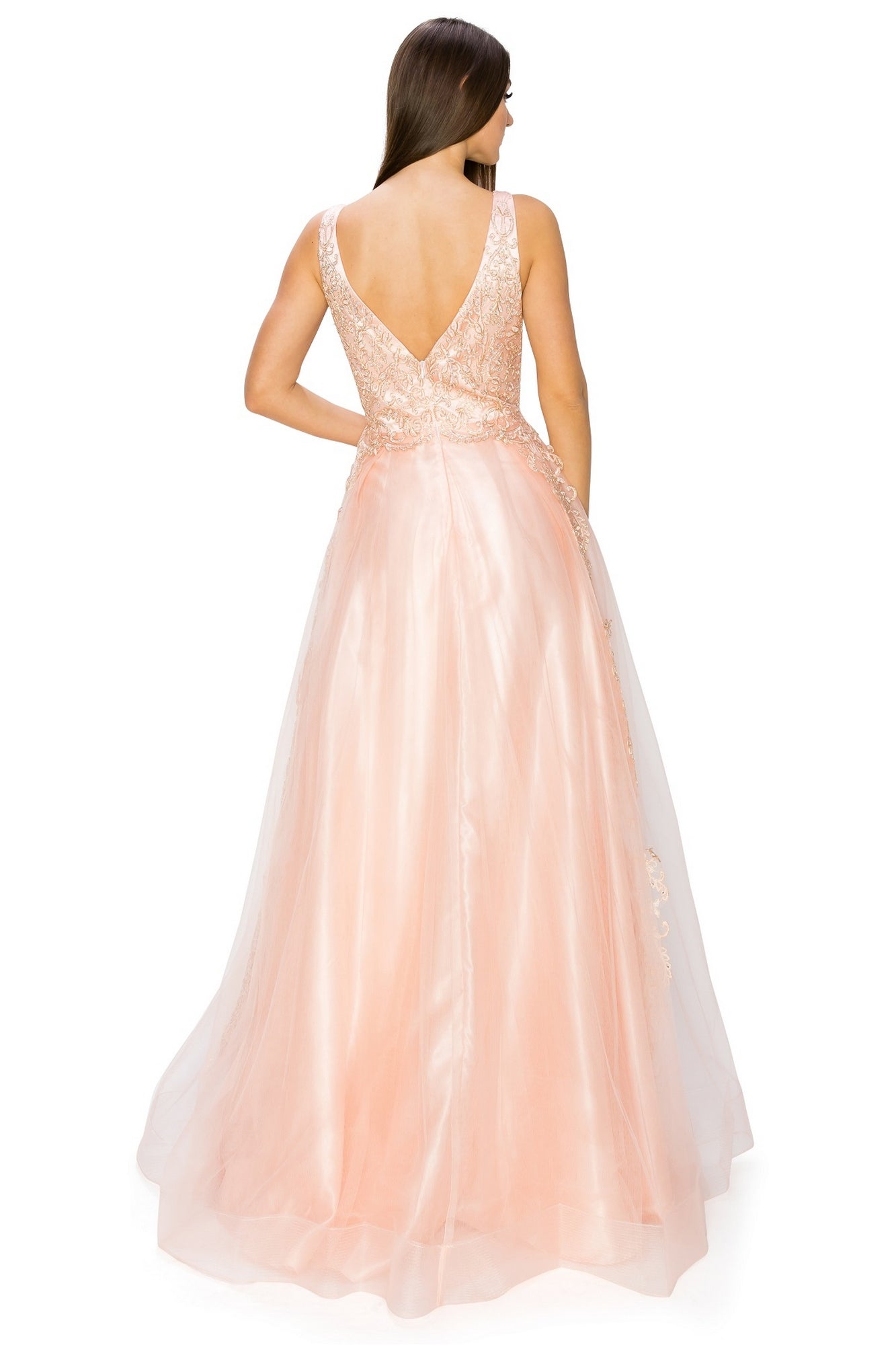 Woman in an affordable A-Line Gold-Embroidered Long Prom Ball Gown 8029J, featuring a sleeveless lace bodice and flowing tulle skirt, stands with her back to the camera.