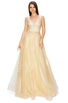 A woman models the A-Line Gold-Embroidered Long Prom Ball Gown 8029J—a sleeveless, floor-length champagne dress with lace detailing and a deep V neckline, combining elegance and affordability for special occasions.