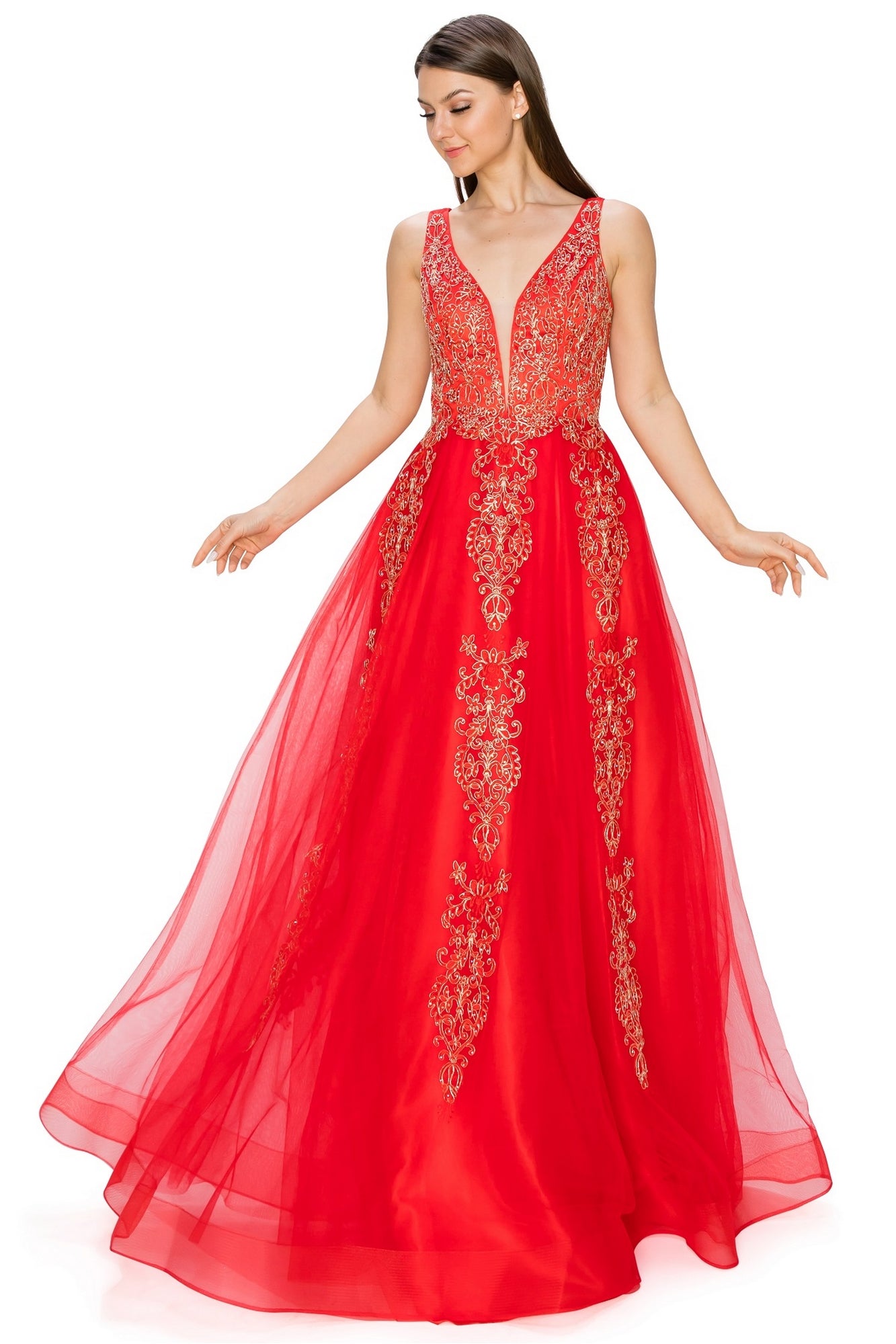 A woman poses gracefully in the A-Line Gold-Embroidered Long Prom Ball Gown 8029J, featuring a floor-length skirt and deep V-neckline, with her arms gently extended.