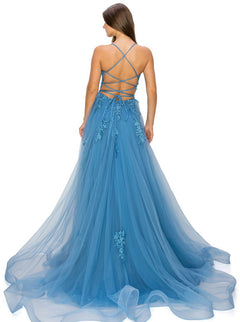 A woman stands with her back to the camera, wearing the Floral-Embroidered Long Tulle Prom Dress 8031J featuring blue tulle, delicate floral appliqué, and a strappy open back.