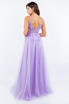 A woman faces away, wearing the Sheer-Bodice Long A-Line Prom Ball Gown 8038J in lavender, featuring a floor-length skirt, sleeveless cut, deep V-back, and intricate 3-D floral bodice designs.