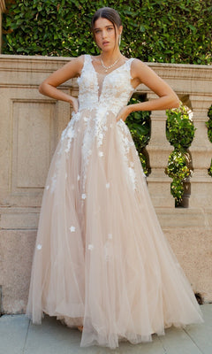 A woman stands outdoors in front of a stone railing, wearing the Cinderella Couture 8040J long formal dress in champagne, featuring a sleeveless design, elegant 3D floral lace appliques, and a flowing tulle floor-length skirt.