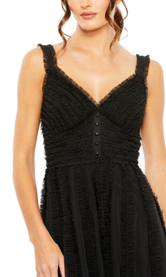 A woman in the Mac Duggal 8056 Ruffled Midi Wedding Guest Dress, a sleeveless black party dress with textured ruffles, a V-neckline, and decorative bodice buttons.