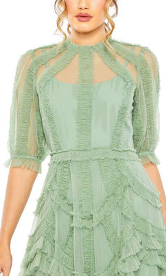 Woman wearing the Mac Duggal 8058 Ruffled Midi Wedding-Guest Dress in light green, featuring sheer sleeves and ruffle details, shown from shoulders to mid-thigh.