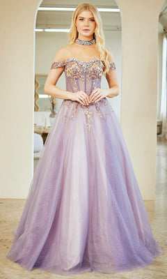 A woman stands indoors facing forward, wearing the Amelia Couture 8063 Long Prom Dress, a lavender off-the-shoulder gown with floral embellishments and delicate sequin applique.