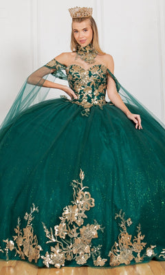 A woman wearing a gold crown and the Quinceanera Ball Gown 8064J—an emerald green off-the-shoulder dress with gold floral embroidery—sits against a plain white background.