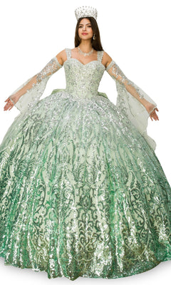 A woman wearing the Quinceanera Ball Gown 8080J, a jeweled crown, necklace, and long gloves stands with arms outstretched against a white background.