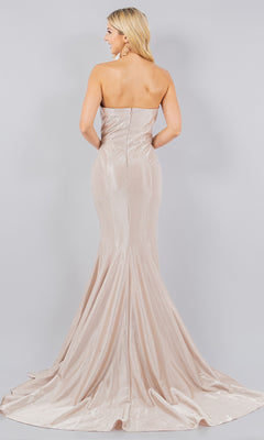 A woman faces away wearing the Cinderella Couture 8083J Satin Mermaid Prom Dress, a strapless, floor-length gown in light beige with a slight train, set against a plain grey background.